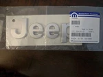 Genuine Mopar Hood Nameplate 68243731AA (silver) For 17-23 Jeep Compass. Fixed Price $50.00.