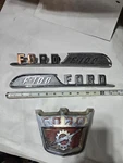 Original 1957 Ford 100 Hood Ornament And Side Emblems. Fixed Price $240.00.