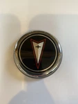 Nos Oem Pontiac Trunk Lock Cover Emblem 20245064. Fixed Price $79.99.