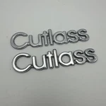 82-90 Oldsmobile Cutlass Front Fender Nameplate Emblem Set. Fixed Price $25.00.
