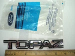 1988 89 Mercury Topaz Plate Ornament Emblem Medallion Nos. Fixed Price $49.00.