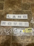 Genuine 2010 Land Rover Front Emblem Name Plates, Used. Fixed Price $180.00.