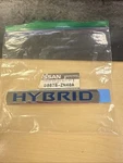 New Oem Nissan Front Door Hybrid Badge PN:80878-ZN40A, Priced At $35. Fixed Price $35.00.