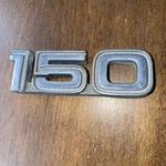 1983 - 1991 Ford Econoline 150 Fender Emblem. Fixed Price $34.90.