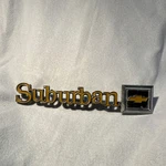 1979-1984 Chevrolet Suburban Tailgate Emblem 14016626. Fixed Price $75.00.