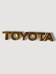 1999-2003 Toyota Solara Gold Rear Trunk Badge Nameplate Emblem 75447-06020 Oem. Fixed Price $19.99.