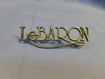 Original Chrysler Lebaron Emblem Pn 4017343 With Both Mounting Studs. Fixed Price $17.95.