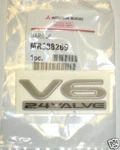 Genuine Mitsubishi Emblem Badge Nameplate " V6-24VALVE Eclipse 00-02 MR388269. Fixed Price $30.00.