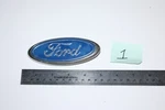 Used Original Oem Ford Manufactured Part # E97B-8C020-AA Oval Emblem Badge. Fixed Price $10.95.