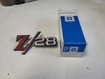 Nos Gm 1969 Z28 Tail Panel Emblem 8701333. Fixed Price $249.00.