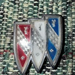 Used Buick Skylark Tri-shield Front Hood Emblem Ornament Missing Outer Circle. Fixed Price $12.00.