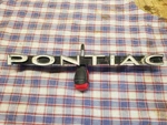 Original 1965 Pontiac Lemans Grille Badge Chrome White Black Emblem 9783355. Fixed Price $25.00.