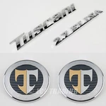 Genuine 2003-06 Tuscani Tiburon Elisa 2.7 Emblem Set No Alignment Tabs. Fixed Price $39.95.