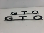 1964 1965 1966 67 Pontiac Gto Nos Quarter Panel Emblem Pair Box Gm 9775668. Fixed Price $150.00.
