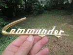 Studebaker Commander Script 299589 7 3/16". Fixed Price $119.99.