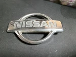 1998 1999 2000 Nissan Frontier Chrome Grille Emblem Badge Oem. Fixed Price $39.99.