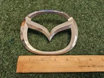 2001-2006 Mazda Tribute Front Grille Emblem Logo Badge Chrome 5'' YL848C020A 5M4. Fixed Price $17.99.