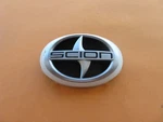 04 05 06 Scion Xb Front Grille Emblem Logo Badge Sign Symbol Used White A43467. Fixed Price $70.00.