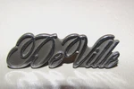 Cadillac Deville Dash Glove Box 1-3/4" Script Emblem 1606001. Fixed Price $14.99.