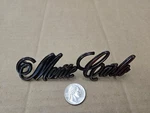 Chevy Oem 1973-1977 Monte Carlo Front Fender Side Emblem Badge Logo Name 328948. Fixed Price $33.99.