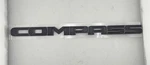 New Oem Genuine Mopar Front Door Compass Nameplate Left 68252644AA Black. Fixed Price $107.96.