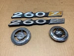 Vintage 1974 1975 Datsun 260Z Fender Emblems Oem Used Set. Fixed Price $89.99.