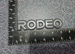 Izuzu Rodeo Emblem Badge Nameplate Plastic Original Part # 8970447430. Fixed Price $9.50.