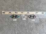 Genuine Oem Matte Black Emblem Badge 4PC Set For 2024-2025 Hyundai Santafe. Fixed Price $179.99.