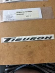 New 2003 To 2006 Hyundai Tiburon Rear Nameplate Emblem Oem 00229-E3000 / Su 2192. Fixed Price $26.54.