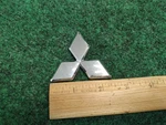 Mitsubishi Oem 02-05 Eclipse Front Bumper-emblem Badge Nameplate MR971389 4S7. Fixed Price $18.99.