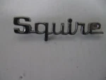 Ford" Squire" Emblem Badge Script Trim Metal D22B-7342528-AA. Fixed Price $28.00.