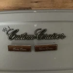 1980-1990 Oldsmobile Oem Custom Cruiser Interior Door Panel Emblem Lot 2029673. Fixed Price $25.00.
