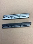 Pair 1982-1987 Chevrolet Camaro "Z28" Gray Rocker Emblem Oem. Fixed Price $15.00.