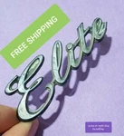 BIN#7 1974-76 Ford "elite" Emblem D40B-16702-AA. Fixed Price $29.99.