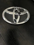 Oem Toyota Grille/panel Emblem Part #75301-02040. Nos Genuine. Fixed Price $17.99.