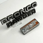 1970S Bronc Ranger Xlt Emblems #D7TB-10023A48-AWA, D8TB-98023A48-DW. Fixed Price $22.99.