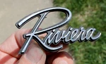 (1) 1970 Buick Riviera Script Emblem Oem 87-91136. Fixed Price $45.00.