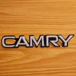 1987-1991 Toyota "camry" White Trunk Emblem P/n 75442 03010 With Pins!. Fixed Price $8.99.