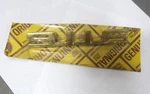 Nos 1969-73 Porsche 911E Gold Decklid Emblem. Fixed Price $395.00.