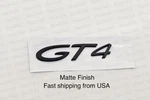 Porsche Cayman "GT4" Rear Emblem Badge Matte Black 98155925180. Fixed Price $86.00.