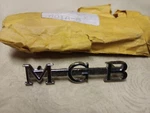 Trunk Badge Emblem For 1963-1976 Metal AHH6079 "mgb" Nos. Fixed Price $19.95.