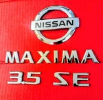 2004-08 Nissan Maxima 3.5 Se Rear Trunk Lid Emblems Badge Adhesive Included. Fixed Price $34.00.