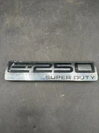 09-14 Ford Econoline E-250 Super Duty Emblem 6C24-15402A17. Fixed Price $34.00.