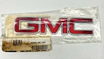 # 20870285 Nos Genuine Oem Gmc Emblem Badge Package Still Sealed Never Opened. Fixed Price $42.00.