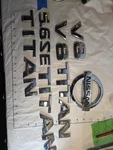 2004-2015 Nissan Titan 5.6 Oem Factory Chrome Rear Trunk Tailgate Emblem Set. Fixed Price $99.99.