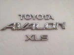 98-99 Toyota Avalon Xls Rear Emblem Silver Chrome P# 75442-AC010 Genuine. Fixed Price $24.49.