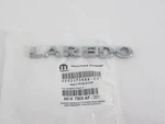 Genuine Oem Mopar Jeep 55157303AF Rear "laredo" Nameplate 05-15 Grand Cherokee. Fixed Price $63.72.