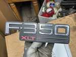 (one) 1992-1997 Ford F-350 Xlt Fender Emblem Badge Logo F2TZ-16720-J. Fixed Price $15.00.