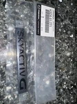 Genuine Mazda Nameplate KSD5-51-771, Skyactiveg, New Oem. Fixed Price $30.00.