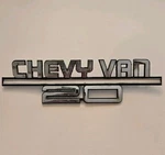 1986-1990 Chevrolet "chevy Van 20" Metal Fender Emblem Bent P/n 14060364. Fixed Price $14.99.